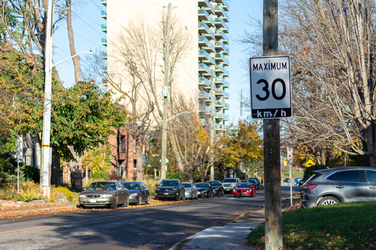 Ottawa, Canada - November 4, 2023: Speed limit sign on the road in the city, 30 km per hour.